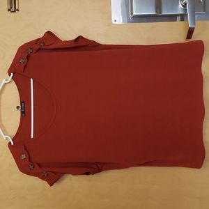 Shirt is by Notebuk in a size Medium in a rust color.